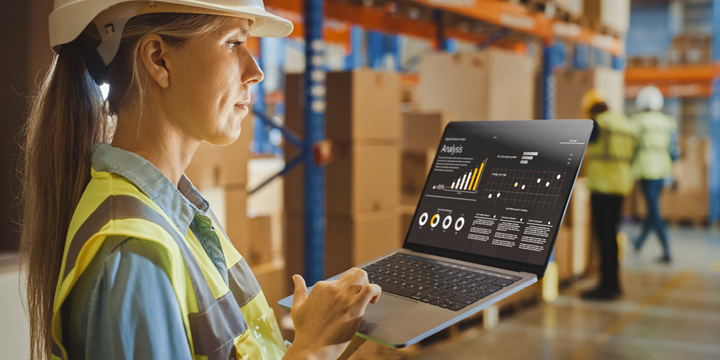 What is Transportation Management System ROI - Woman with Computer